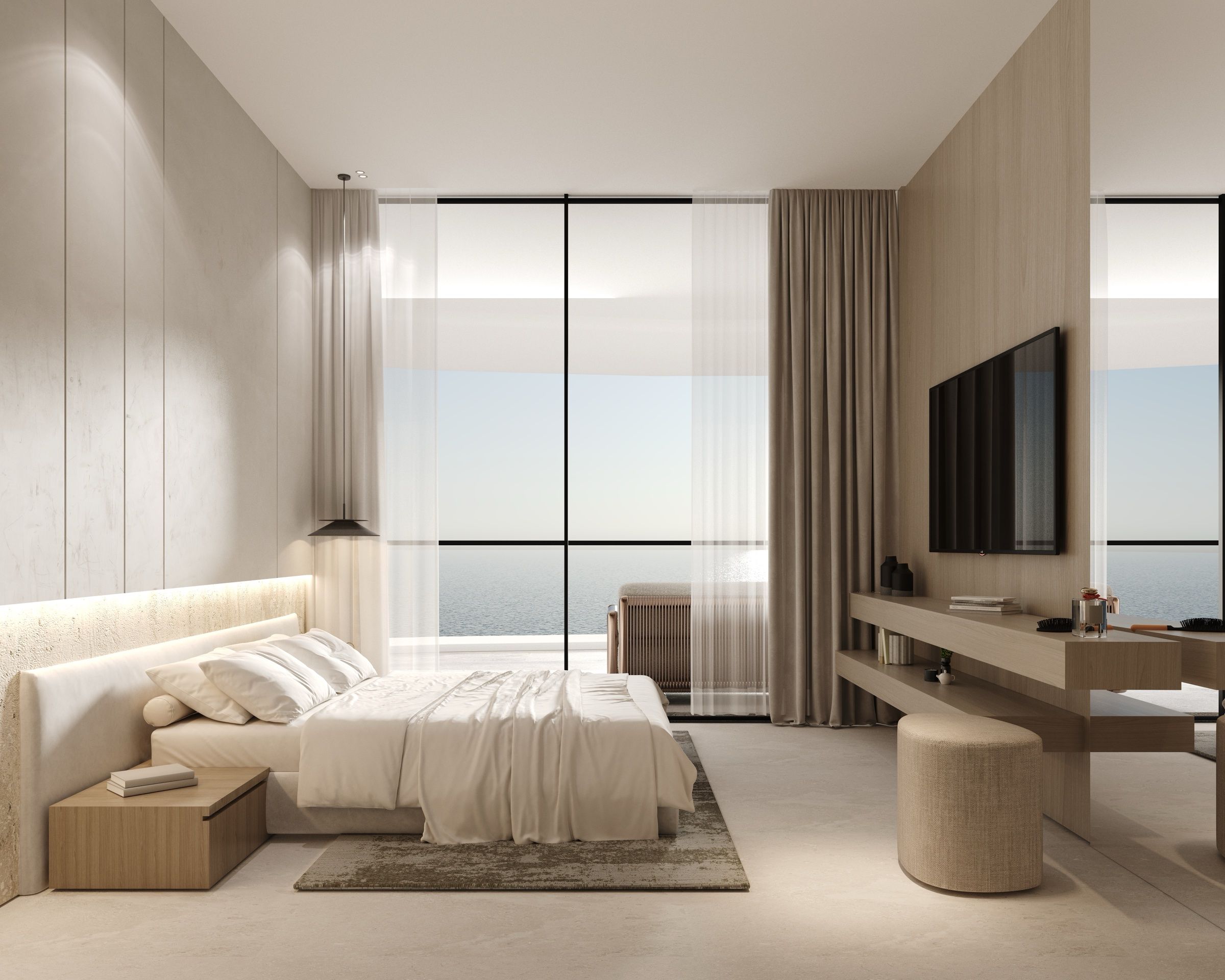 Interno arredato con vetrate sul mare